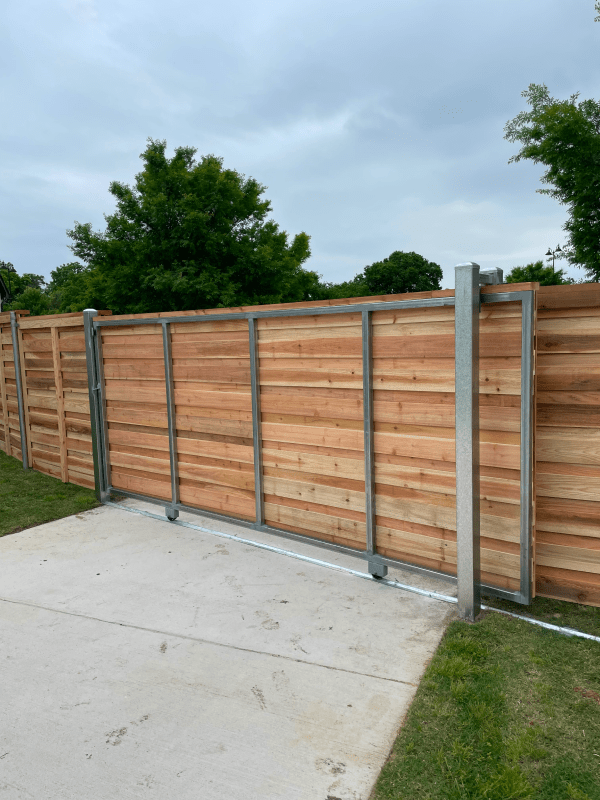 Manual sliding gate