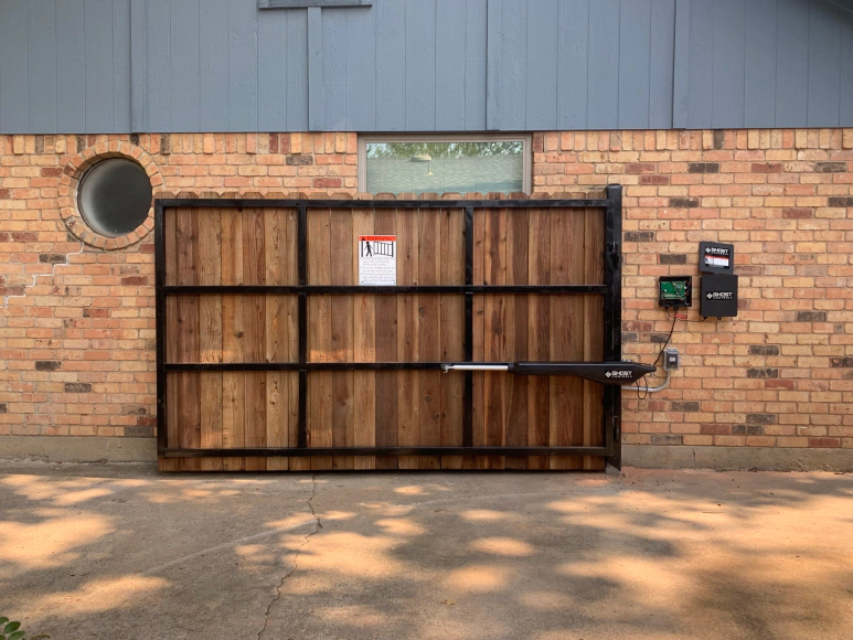 Single swinging iron frame with matching wood to match the existing fence 1