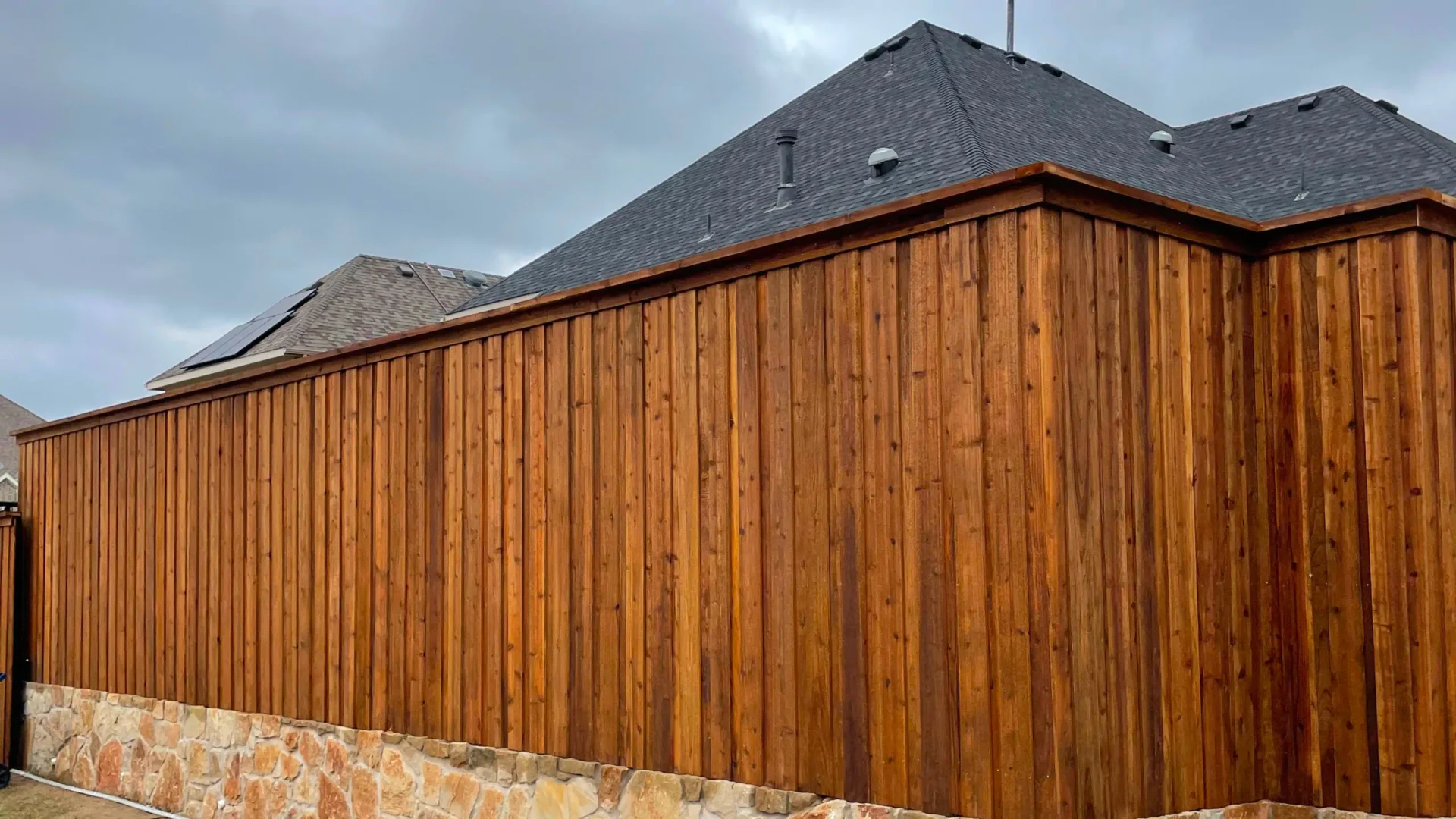 wooden privacy fence installed in a house